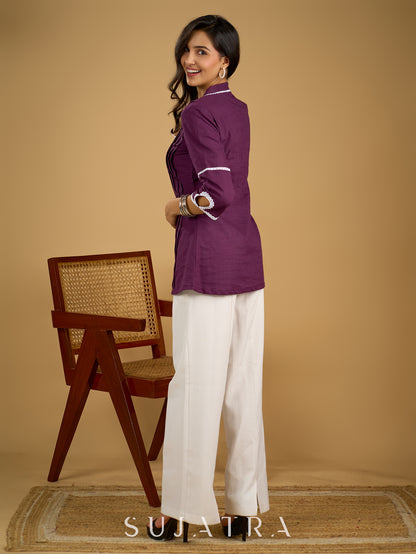 Elegant purple cotton top beautifully finished with delicate lace detailing