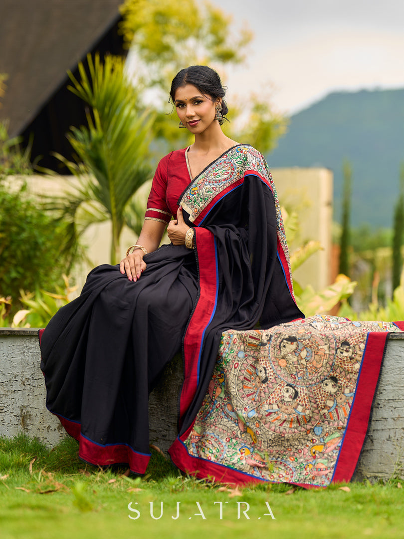 Striking Black Modal Saree with Hand-Painted Madhubani Pallu & Maroon-Blue Border