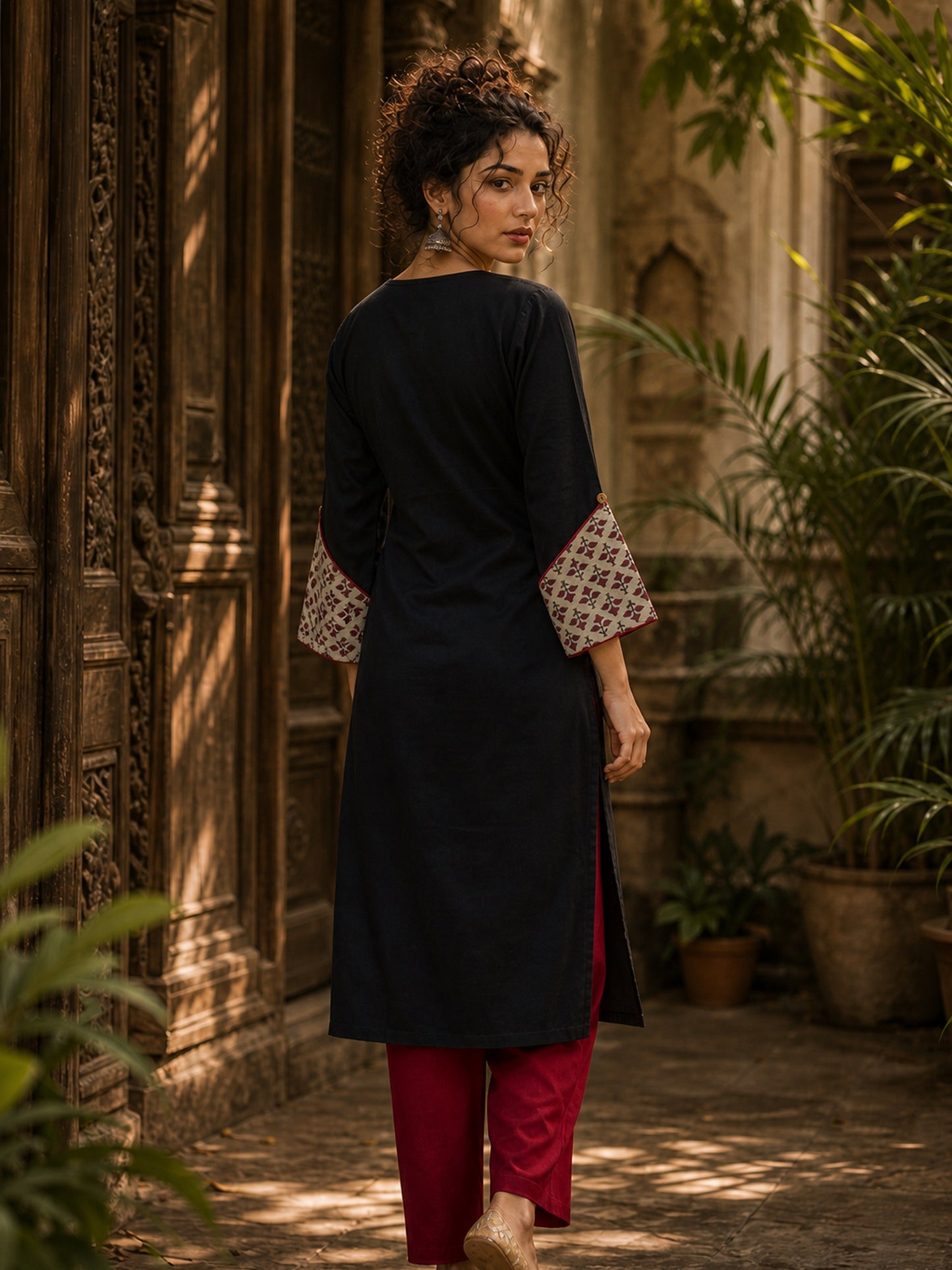 Black Cotton Kurta with Ajrakh Printed Yoke & Matching Cuffs with Minimal Embellishment