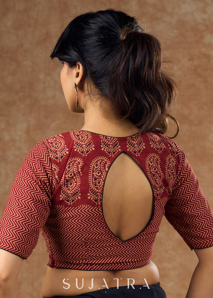 The rich bold look of this blouse is perfectly complimented by ambi & zigzag Ajrakh details creating a truly beautiful piece