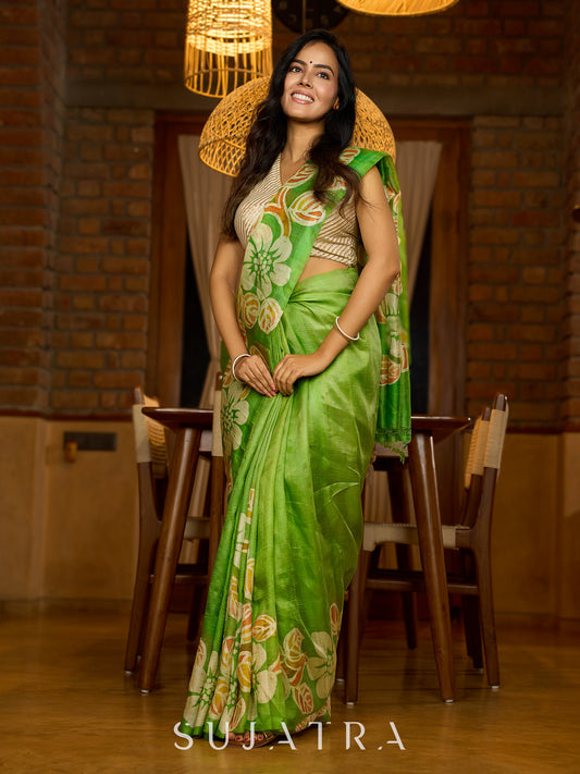 Handcrafted pure silk beauty in green with vibrant hand batik floral motif