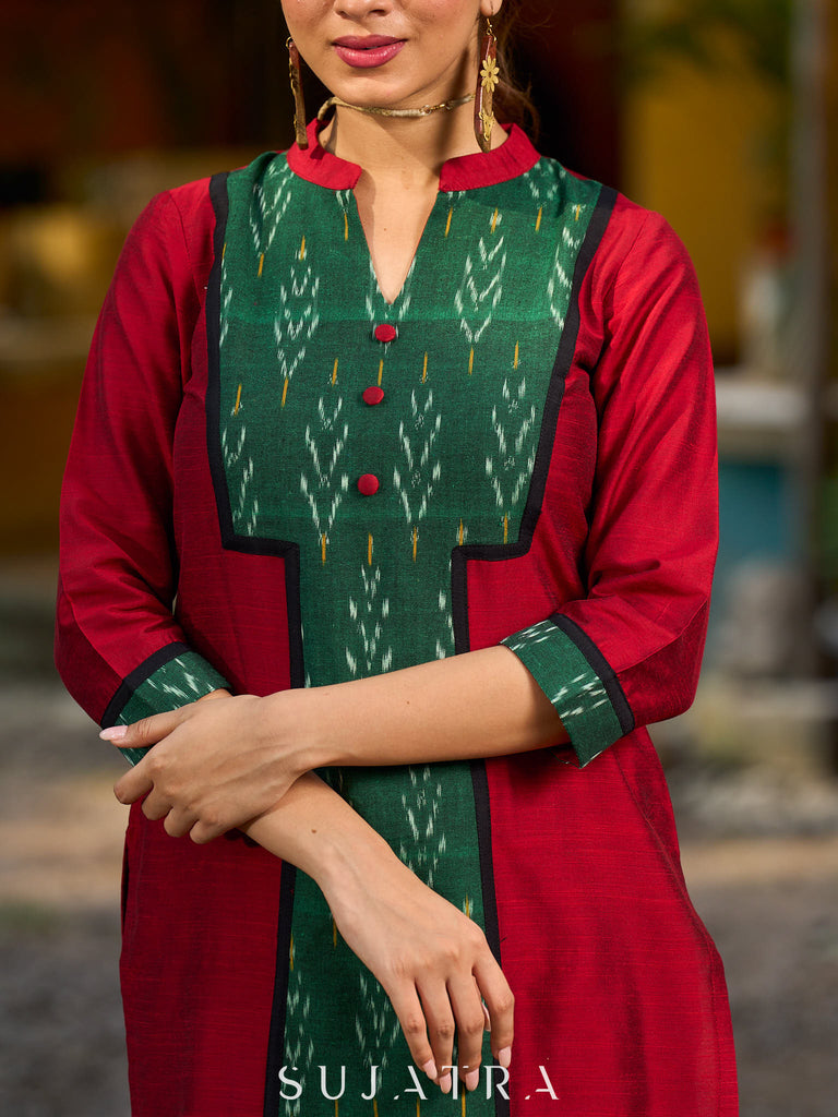 Elegant maroon cotton-silk kurta featuring a green Ikat patch and stand collar.