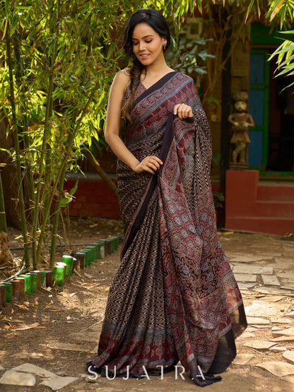 Black Hand Block Printed Ajrakh Modal Saree with Zigzag Pattern and Ornate Border