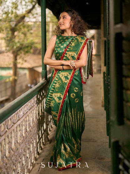 Bottle Green Shibori Art Silk Saree with Contrasting Red Bandhani Border