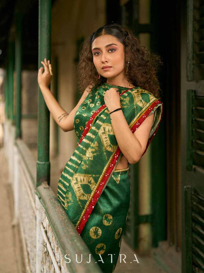 Bottle Green Shibori Art Silk Saree with Contrasting Red Bandhani Border