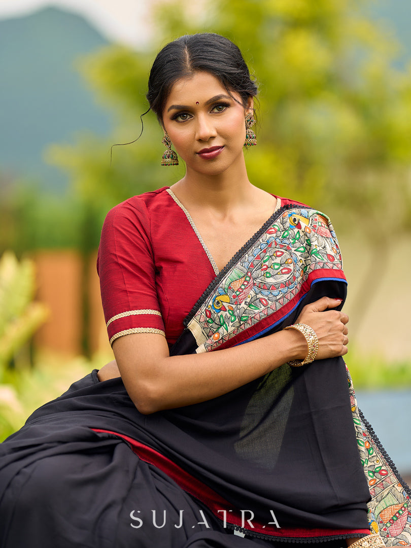 Striking Black Modal Saree with Hand-Painted Madhubani Pallu & Maroon-Blue Border
