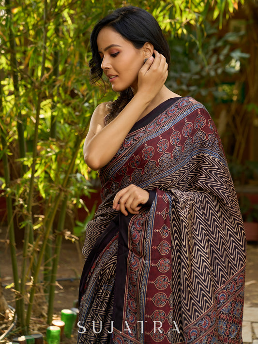 Black Hand Block Printed Ajrakh Modal Saree with Zigzag Pattern and Ornate Border