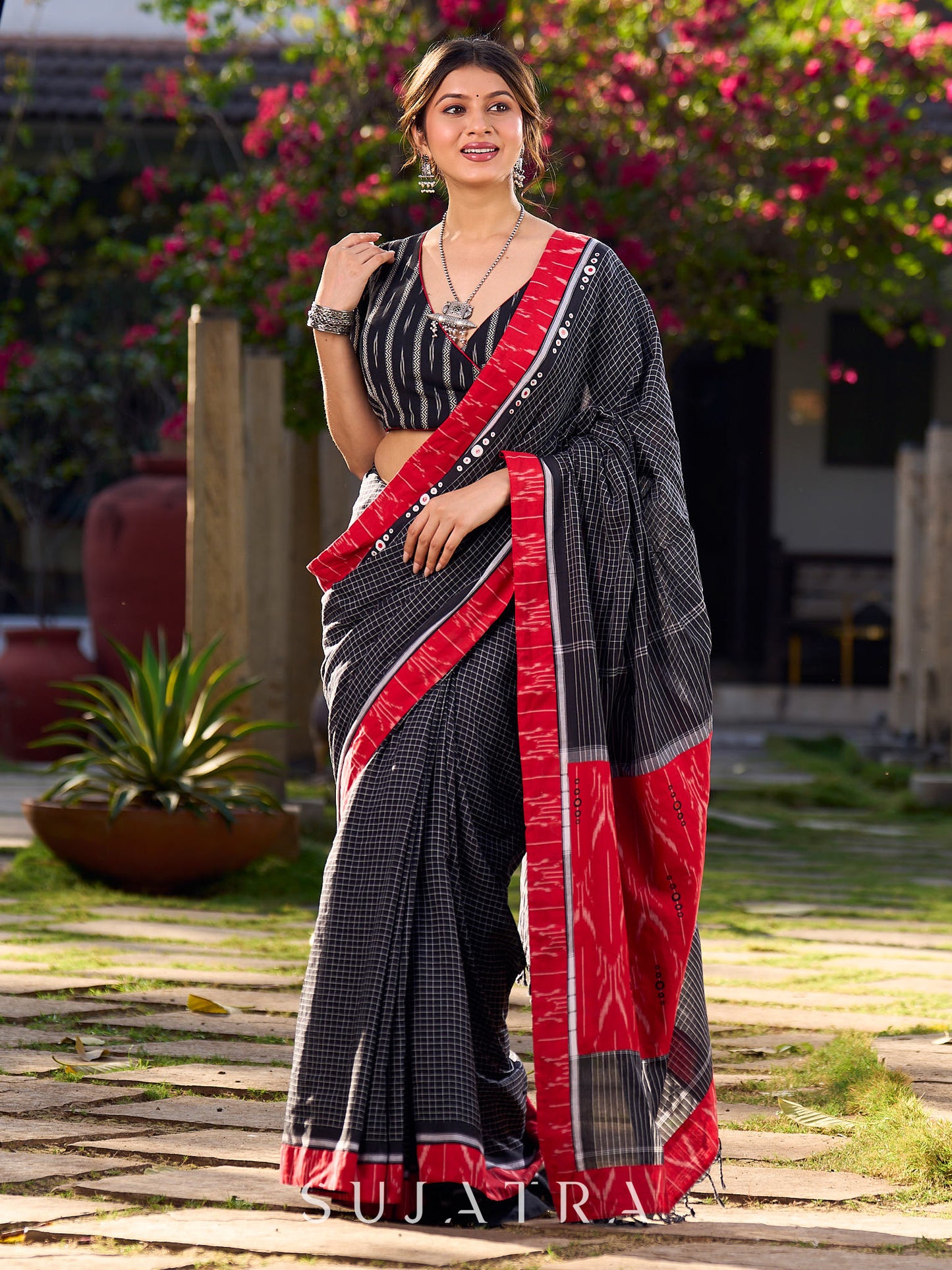 Noir Cotton Checkered Saree with Contrasting Red Ikat Accents