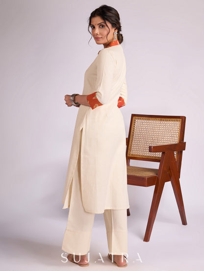 Elegant Off-White Cotton Flex Kurta with Graceful Orange Ikat Yoke, Collar & Cuffs