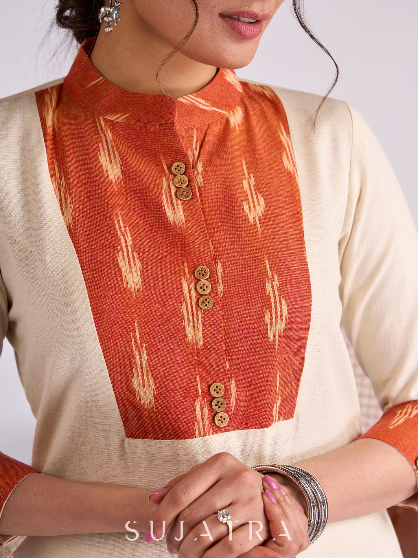 Elegant Off-White Cotton Flex Kurta with Graceful Orange Ikat Yoke, Collar & Cuffs