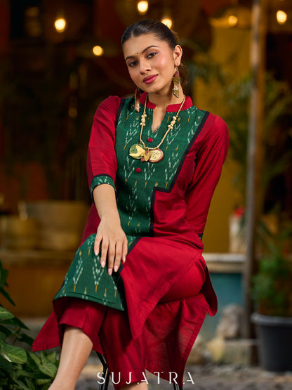 Elegant maroon cotton-silk kurta featuring a green Ikat patch and stand collar.