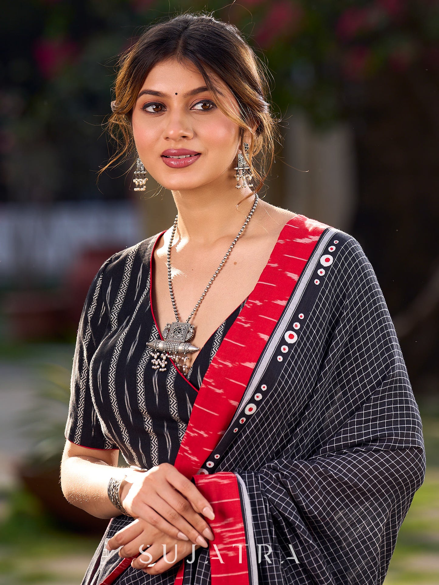 Noir Cotton Checkered Saree with Contrasting Red Ikat Accents