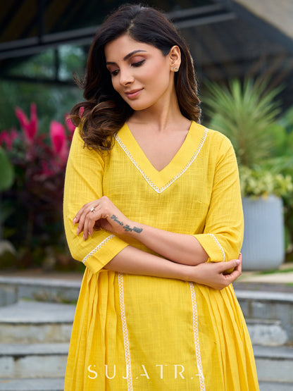 Lemon yellow pleated kurta accented with delicate lace detailing-pant optional