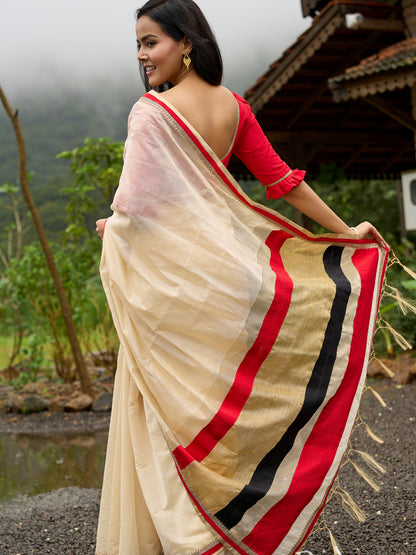 Elegant cream chanderi saree with subtle red border, featuring hand-painted Durga art