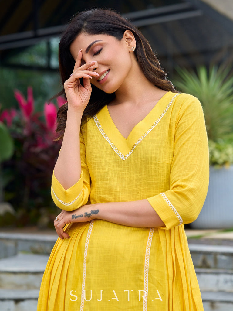 Lemon yellow pleated kurta accented with delicate lace detailing-pant optional