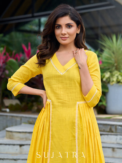 Lemon yellow pleated kurta accented with delicate lace detailing-pant optional