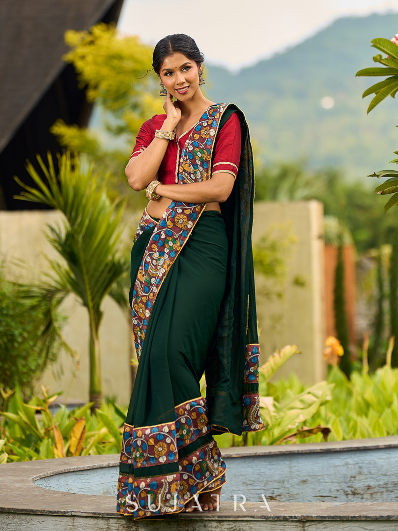 Classic Bottle Green Georgette Saree with Kalamkari Border Detailing & Ajrakh Highlight