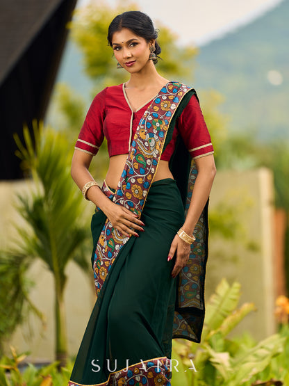 Classic Bottle Green Georgette Saree with Kalamkari Border Detailing & Ajrakh Highlight