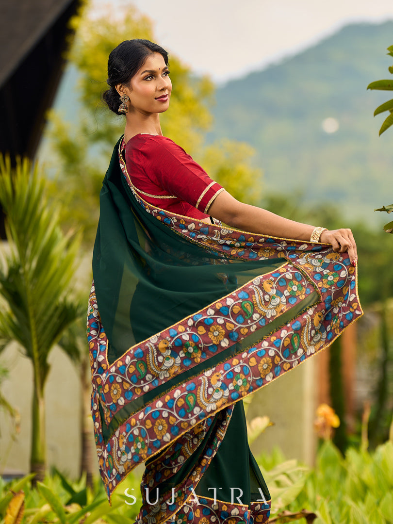 Classic Bottle Green Georgette Saree with Kalamkari Border Detailing & Ajrakh Highlight