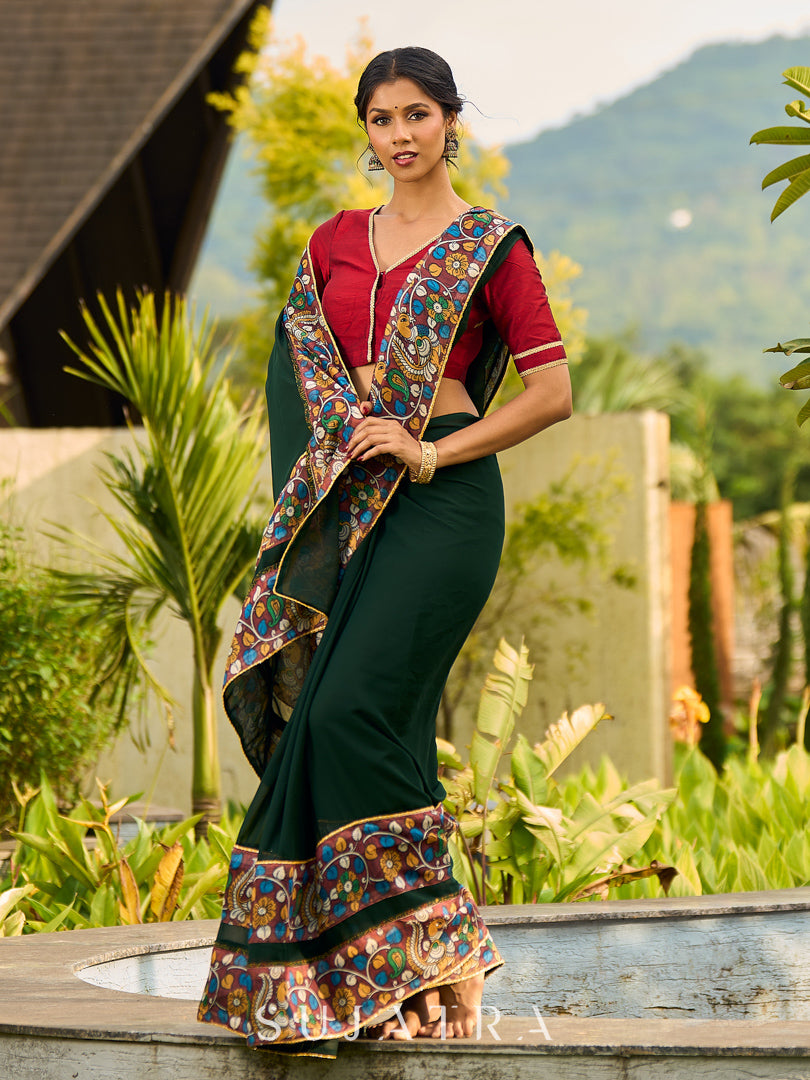 Classic Bottle Green Georgette Saree with Kalamkari Border Detailing & Ajrakh Highlight