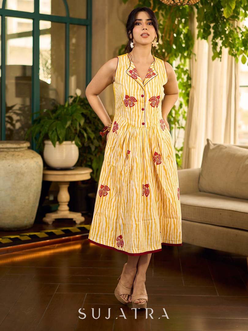Yellow and white zebra-striped hand block printed sleeveless vintage luxe dress with maroon bird motifs and matching accents for a bold, elegant statement look.
