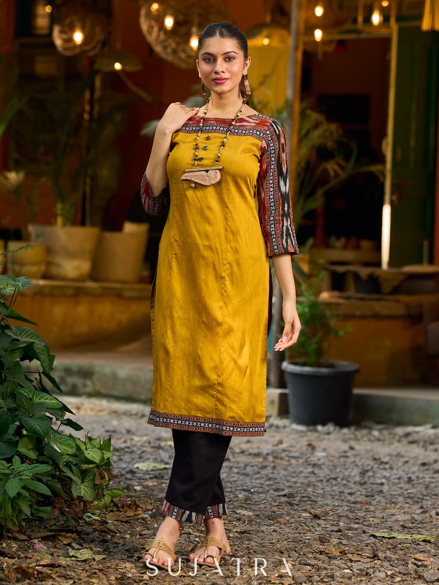 Stunning mustard cotton-silk kurta highlighted with black Ikat