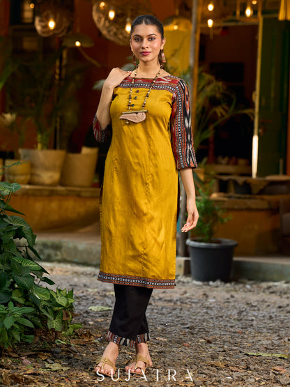 Stunning mustard cotton-silk kurta highlighted with black Ikat