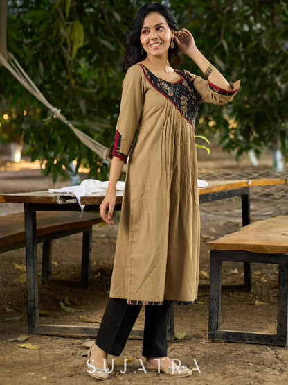 Timeless Beige Cotton Kurta Featuring Ajrakh Asymmetrical Yoke