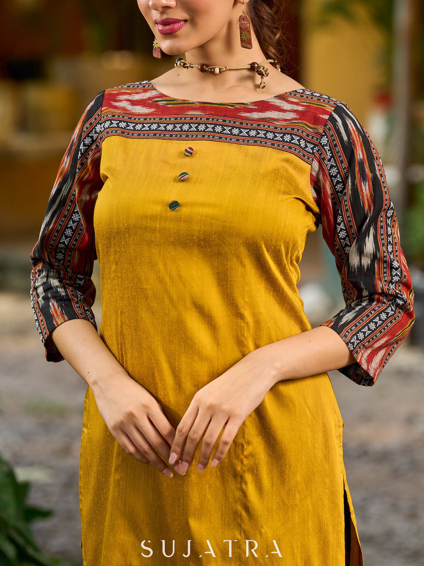 Stunning mustard cotton-silk kurta highlighted with black Ikat