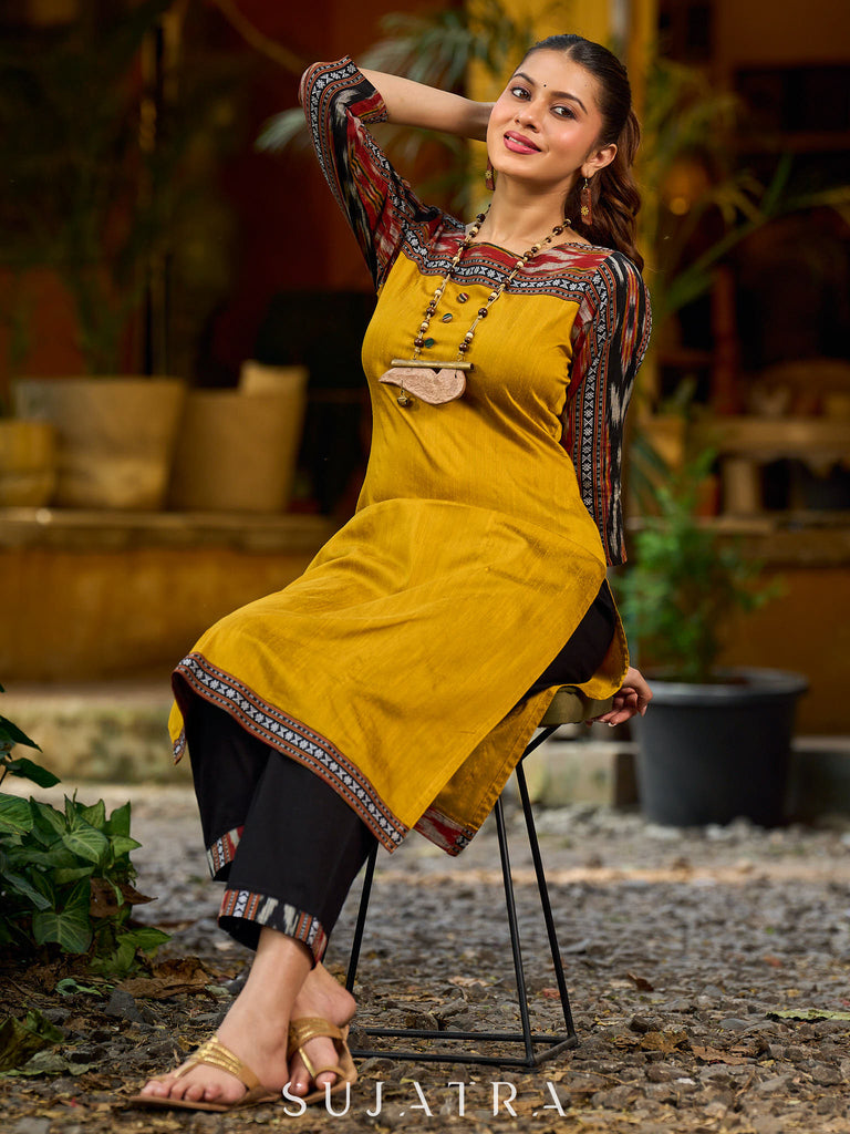 Stunning mustard cotton-silk kurta highlighted with black Ikat