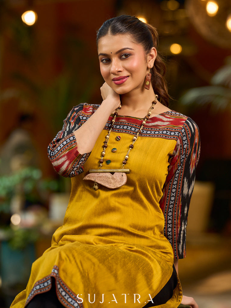 Stunning mustard cotton-silk kurta highlighted with black Ikat