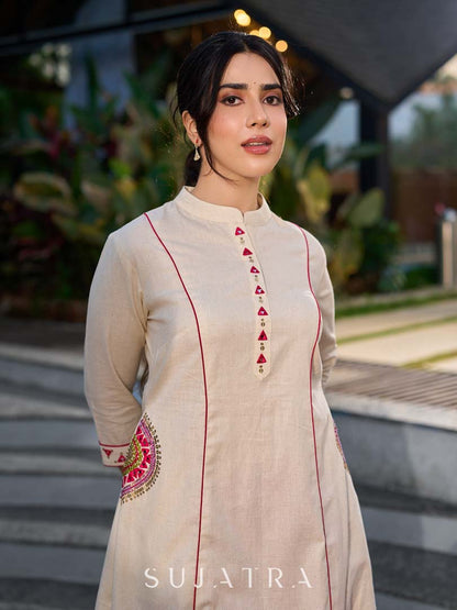 Elegant Off White Cotton A-Line Kurta with Traditional Mirror Work