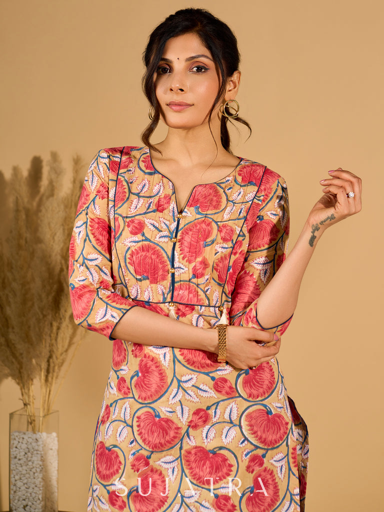 Classic Cream Mul Cotton Printed Kurta with Playful Tassels and Piping