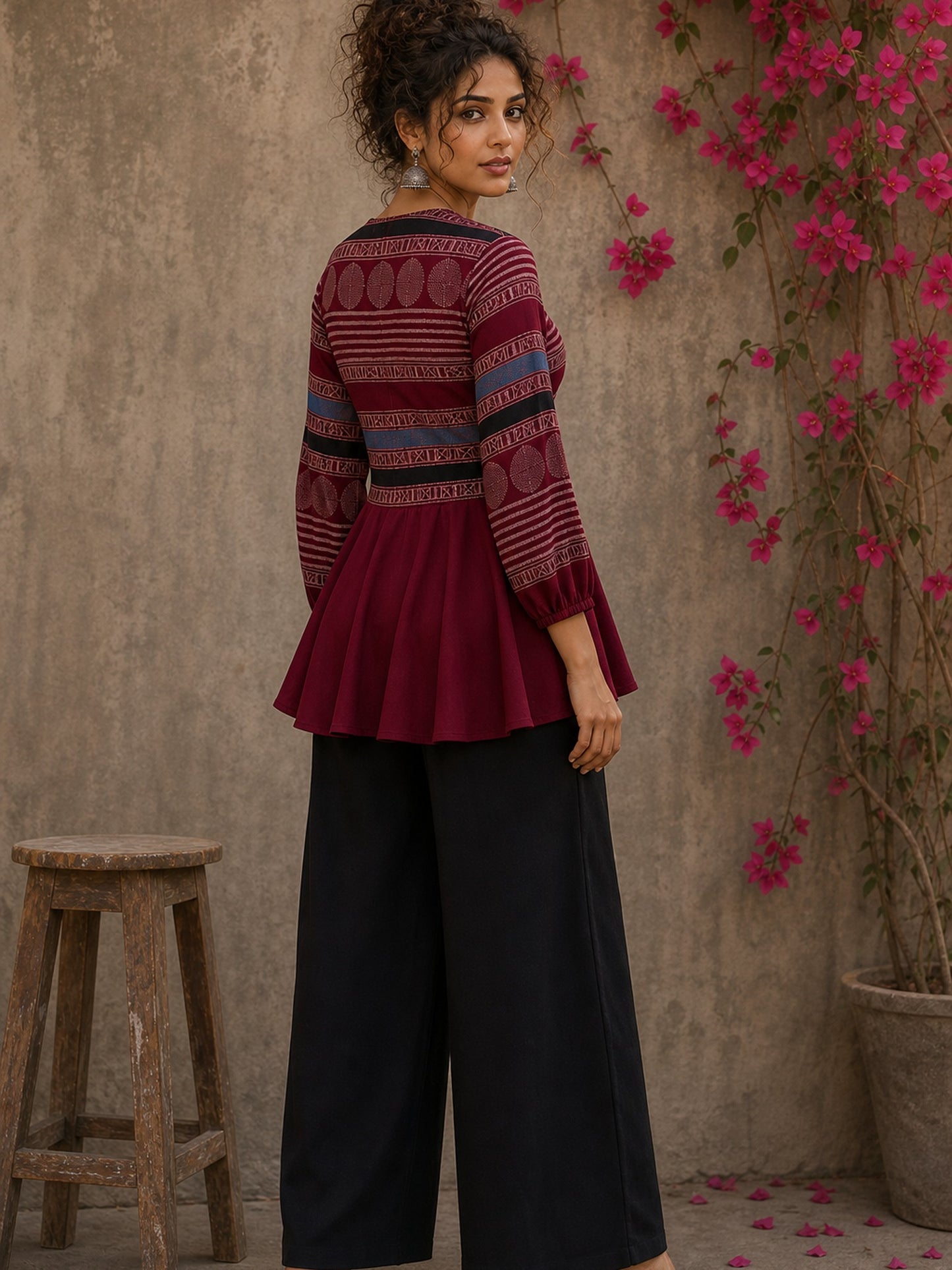 Bold and playful maroon hand block print peplum top with beige geometric motifs and subtle blue accents for effortlessly chic everyday style.