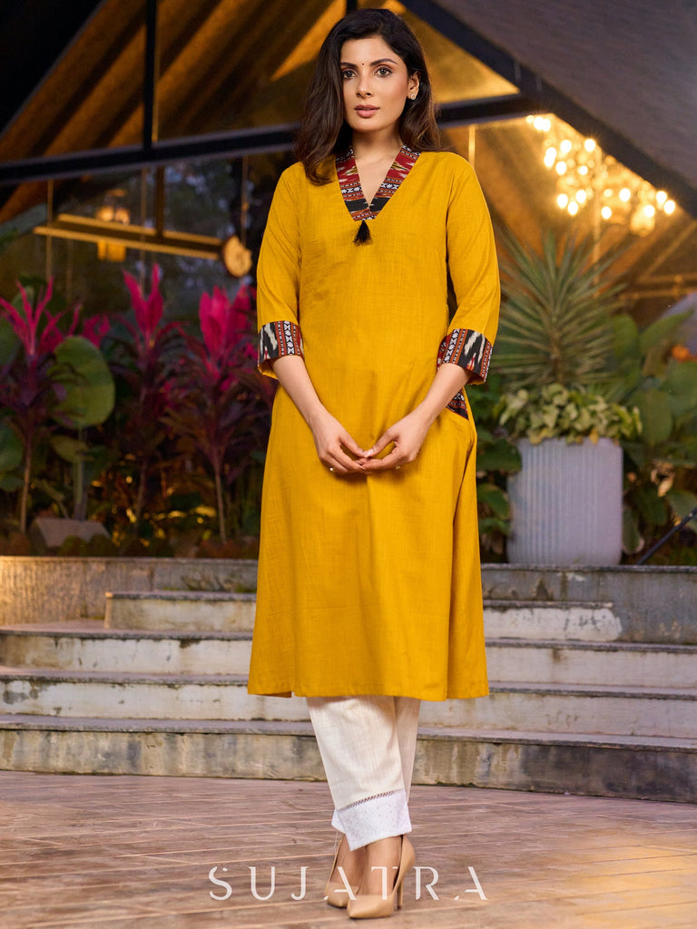 An elegant fusion of cotton comfort and vibrant Ikat charm kurta -white pant optional