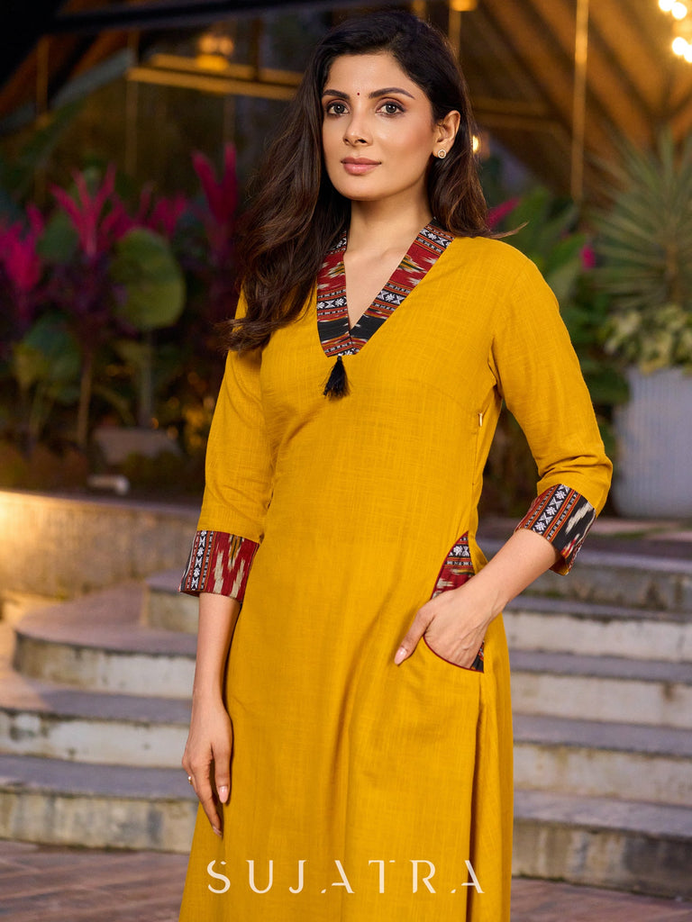 An elegant fusion of cotton comfort and vibrant Ikat charm kurta -white pant optional