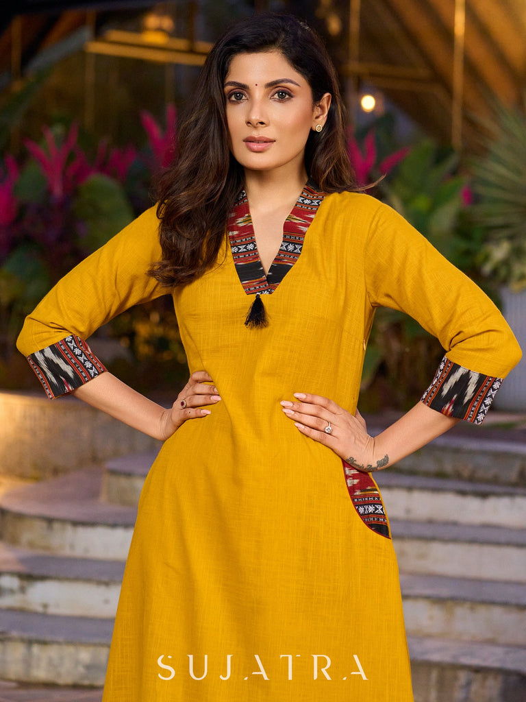 An elegant fusion of cotton comfort and vibrant Ikat charm kurta -white pant optional