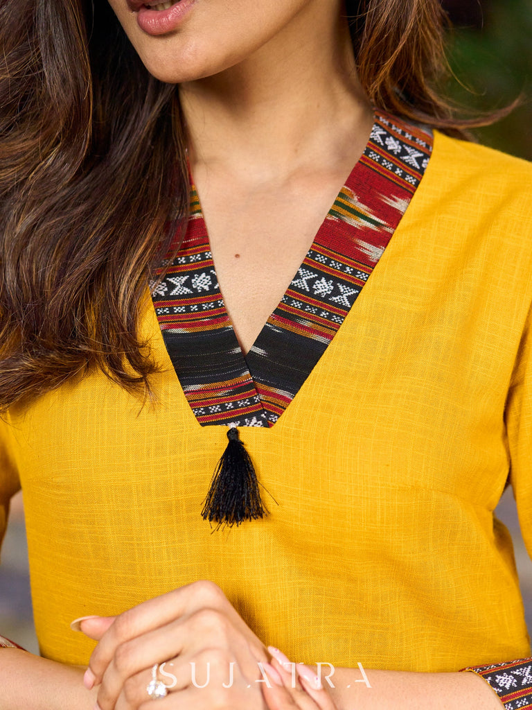 An elegant fusion of cotton comfort and vibrant Ikat charm kurta -white pant optional