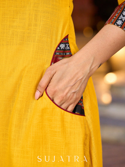An elegant fusion of cotton comfort and vibrant Ikat charm kurta -white pant optional