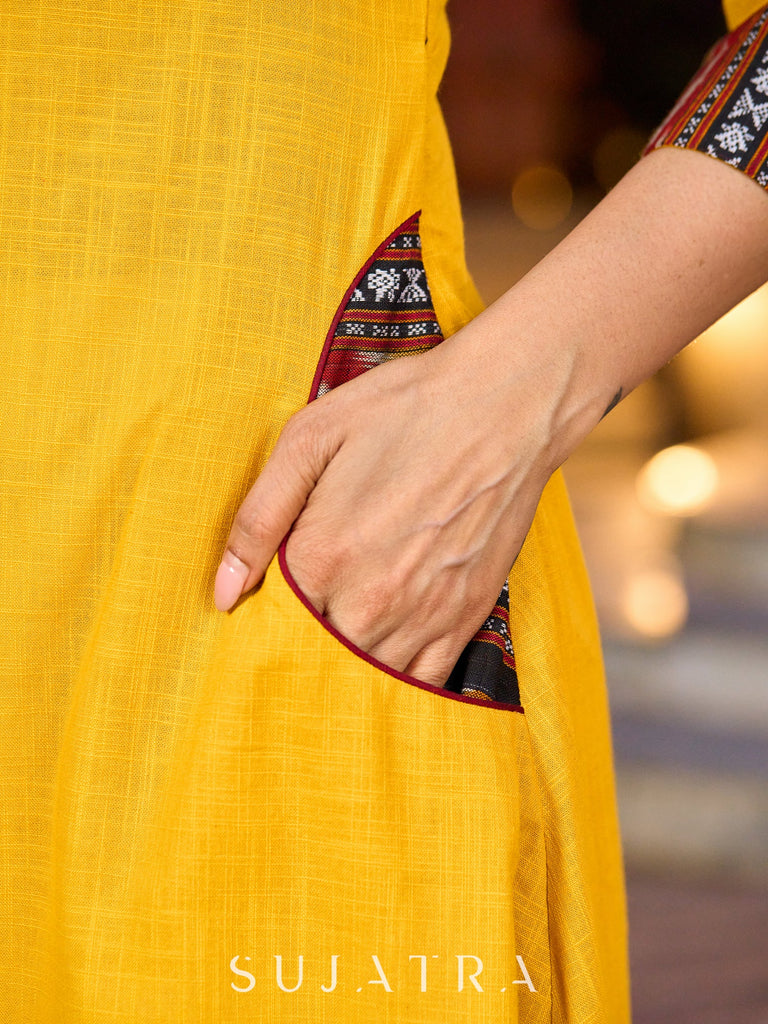 An elegant fusion of cotton comfort and vibrant Ikat charm kurta -white pant optional