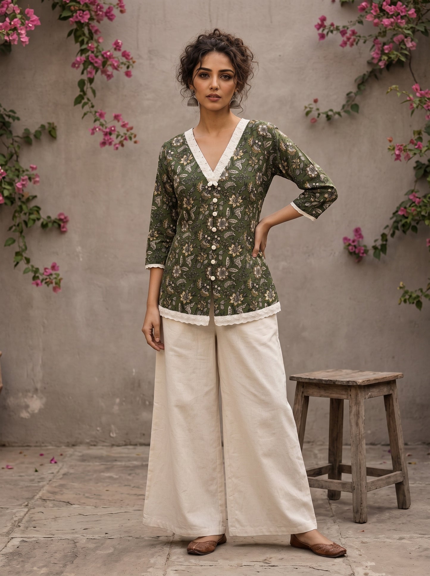 Earthy deep olive Jaipur floral top featuring box-pleated sleeves and delicate Hakoba accents for timeless elegance.