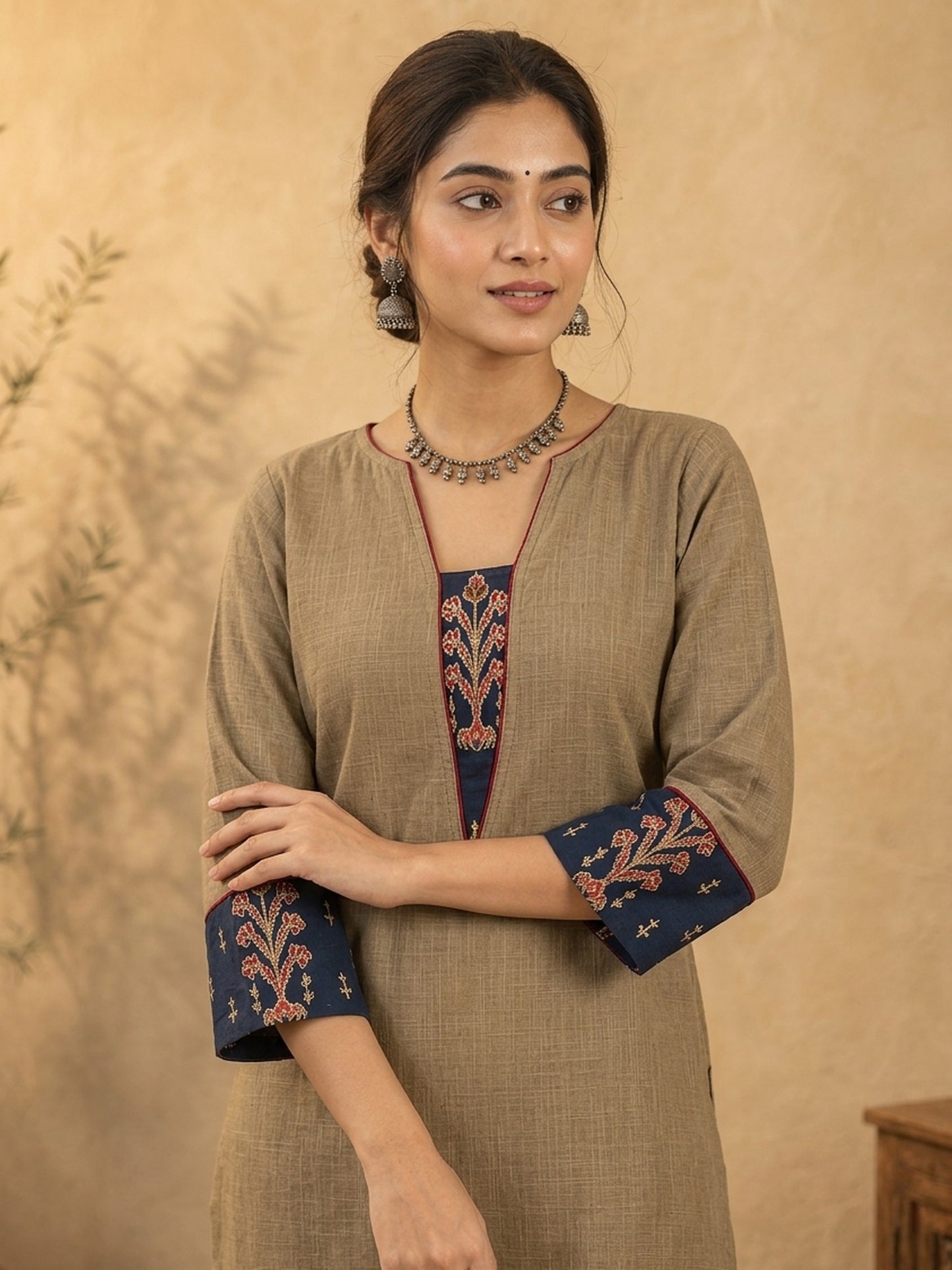 Chic Beige Cotton Kurta with Ajrakh Printed V-Placket & Contrast Navy Cuff Panels