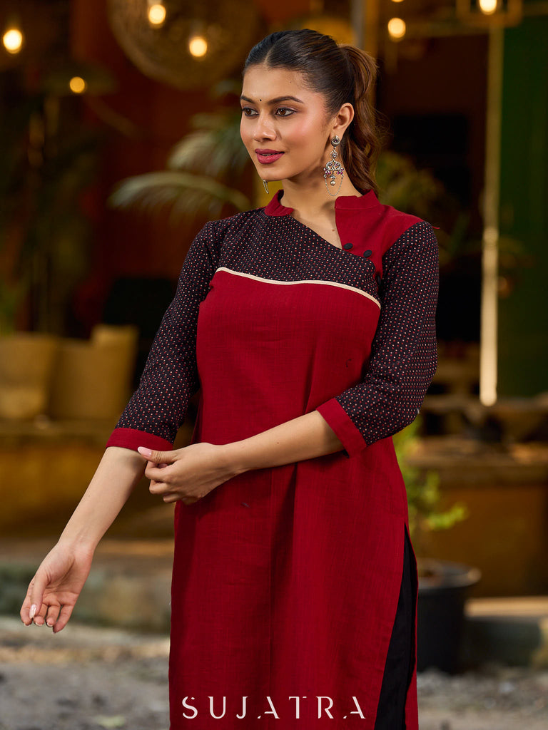 Elegant Ajrakh polka dot kurta with bold black maroon tones and an asymmetrical neck.