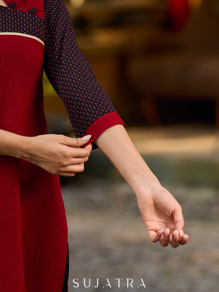 Elegant Ajrakh polka dot kurta with bold black maroon tones and an asymmetrical neck.