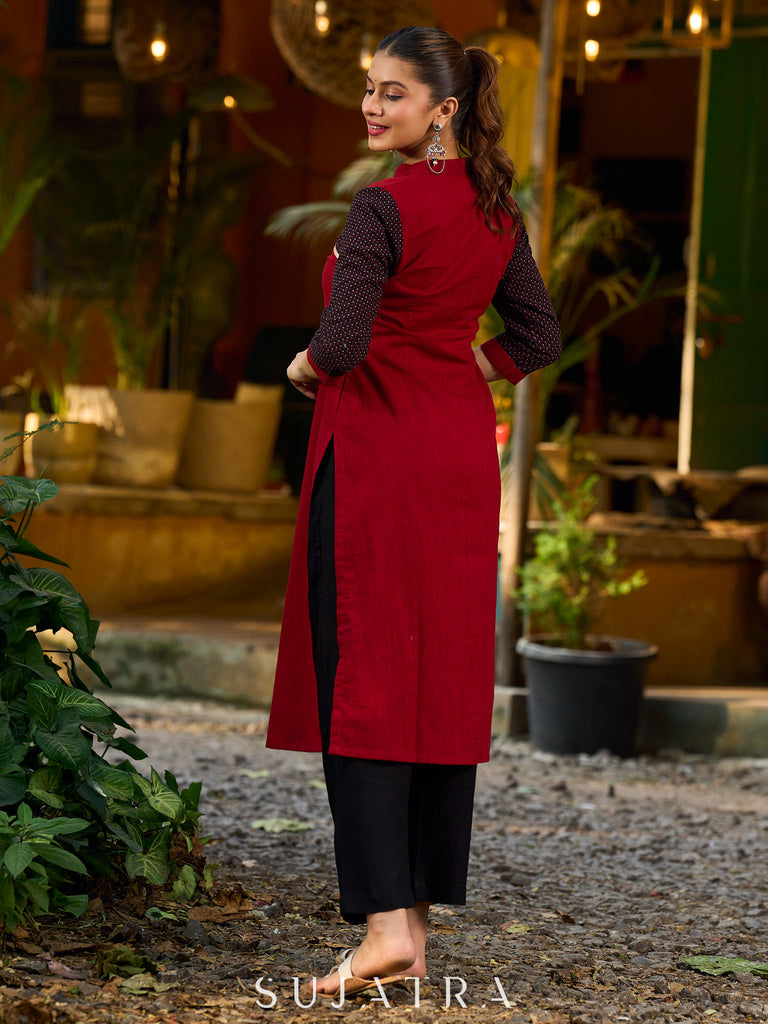 Elegant Ajrakh polka dot kurta with bold black maroon tones and an asymmetrical neck.