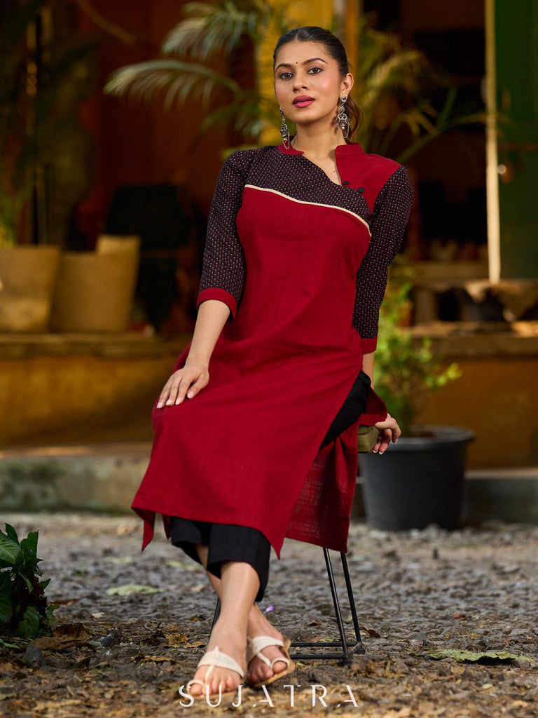 Elegant Ajrakh polka dot kurta with bold black maroon tones and an asymmetrical neck.