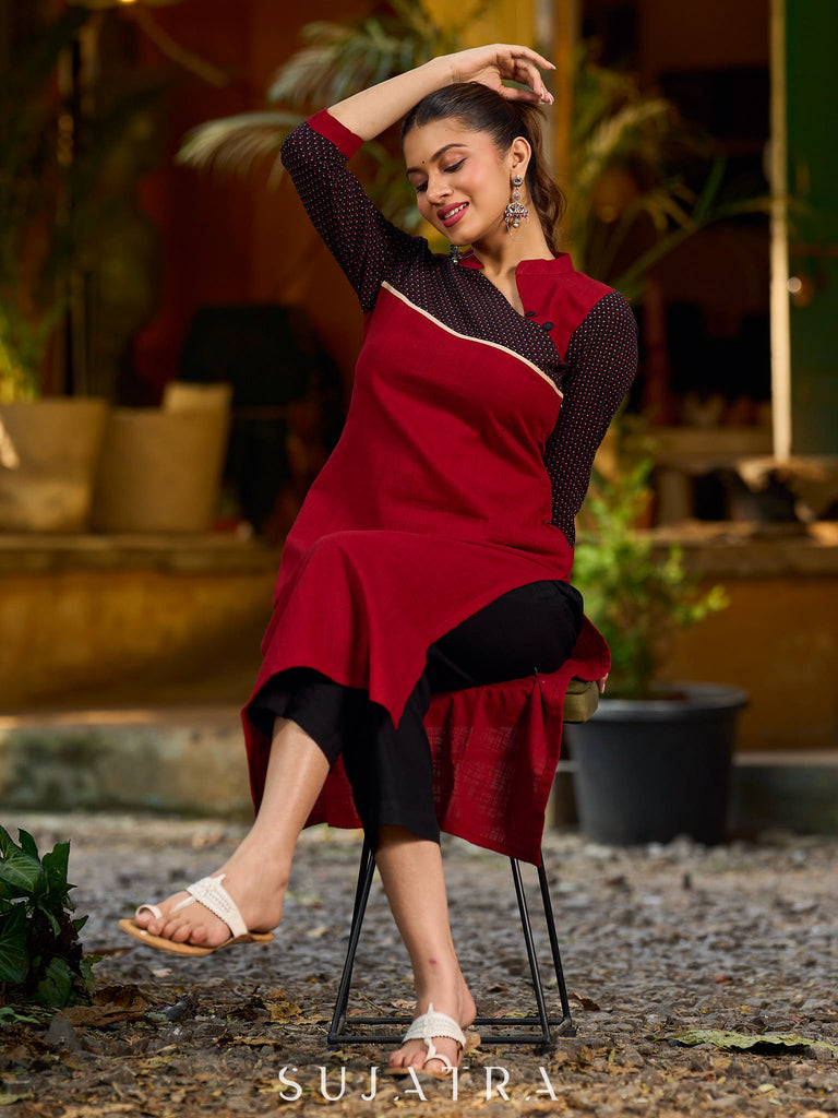 Elegant Ajrakh polka dot kurta with bold black maroon tones and an asymmetrical neck.