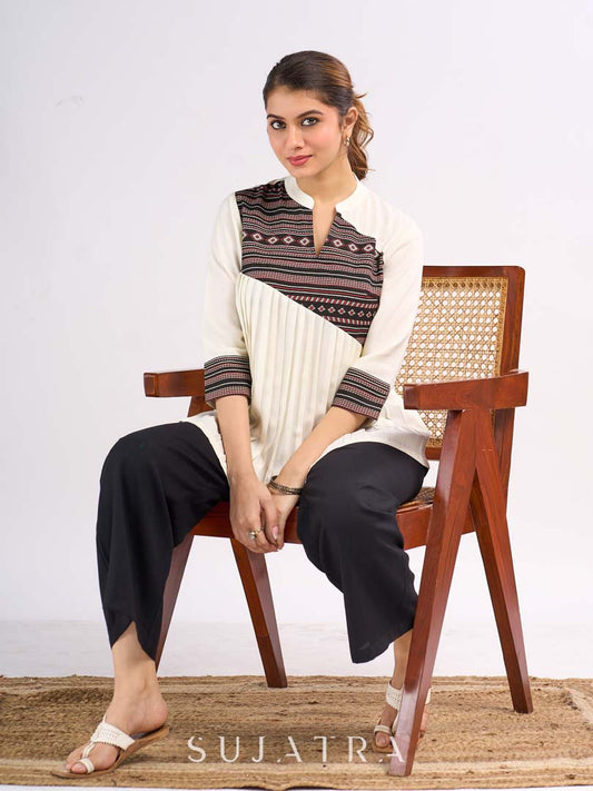 Cream Rayon Designer Top with Contrast Geometric Print Panel & Statement Pleats