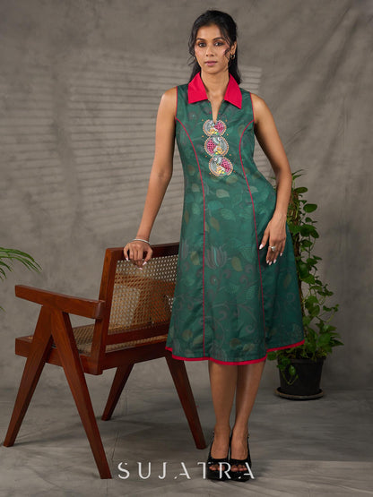 Bottle green Madhubani printed dress with vibrant magenta accents.