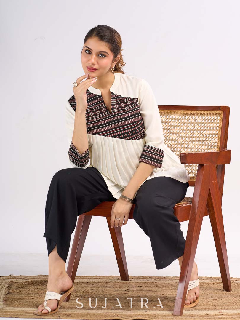 Cream Rayon Designer Top with Contrast Geometric Print Panel & Statement Pleats